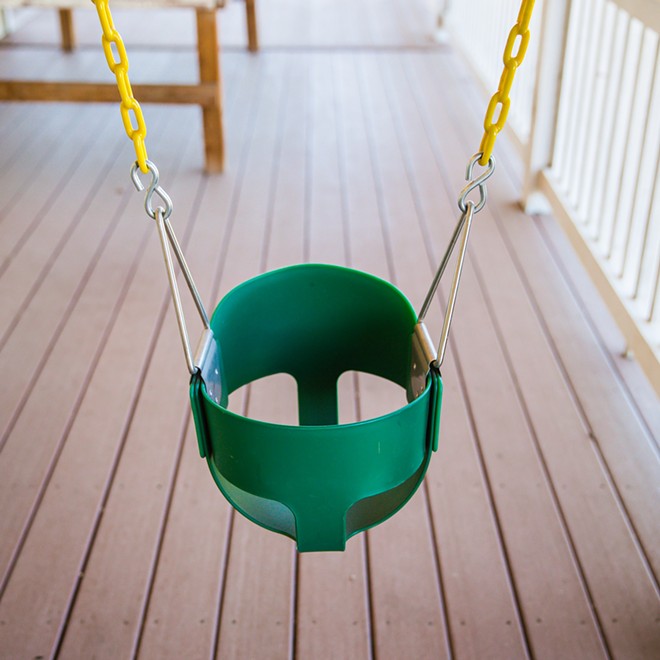 FILLING IN A swing waits for the next foster baby in need at a resource family's Arroyo Grande home.