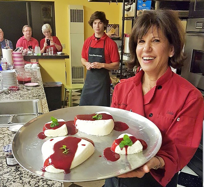 FRENCH DESSERT Every class at CCC ends sweetly, with dessert. Chef Debbie Duggan holds a tray of coeur a la creme after a recent appetizer class.