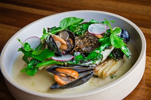 DIG IN The county's Best Seafood is at the Best South Coast Restaurant&mdash;the Oyster Loft in Pismo Beach&mdash;where the roasted sea bass and mussels comes with a spicy sauce, potato puree, pea tendrils, and fennel confit; the oysters are fresh; and the ocean view spans as far as the eye can see. - PHOTO BY JAYSON MELLOM