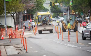 ROADWORK AHEAD County commuters know that smoother roads, new bike lanes, and safer streets are worth the temporary inconvenience while construction crews bring to fruition the Best Use of Taxpayers Money: road improvements. - PHOTO BY JAYSON MELLOM