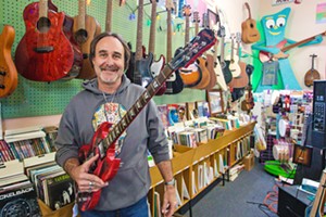 ROCK ON Central Coast Music owner Eddie Frawley takes his customers and his music personally, always on hand to chat tunes or tune up your instrument. Maybe that’s why his spot is the best place to buy musicICAL INSTRUMENTS. - PHOTO BY JAYSON MELLOM