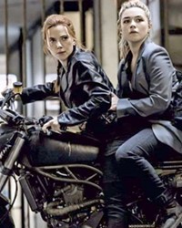 SIBLING RIVALRY Sisters Natasha Romanoff (Scarlett Johansson, left) and Yelena Belova (Florence Pugh, right) have to put aside their differences and work together to save the world from evil, in Black Widow.