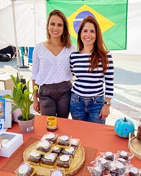 HOOKED ON HONEY Honey Bee SLO co-owners Vanessa Higgins, left, and Carina Lahmeyer sell their homemade Brazilian honey cakes at several Central Coast locations, including Pismo Beach Farmers’ Market at the Pier Promenade on Wednesdays from 4 to 7 p.m. until Oct. 27.