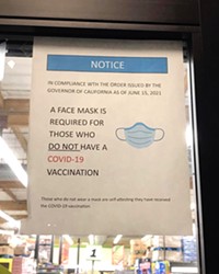 MASK OPTIONAL According to Atascadero resident Colleen Annes, this sign was posted at the city’s Food4Less location as recently as Oct. 8. As of Oct. 12, it appeared the grocery store’s signage was requiring masks for all, though many customers inside were not wearing them.