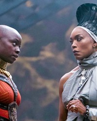 POWER PLAYERS Ayo (Florence Kasumba, left) and Ramonda (Angela Bassett) must save Wakanda from a new foe, an underwater kingdom bent on war, in Black Panther: Wakanda Forever, screening in local theaters.