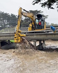 CLAW GRAB To alleviate the flooding in Morro Bay, the city had an excavator stationed on the Main Street Bridge to clear out any debris.&nbsp;