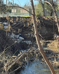 FURTHER SETBACK A January 2023 storm eroded Atascadero Creek (pictured) and left the city with more than $260,000 in emergency repairs. Atascadero now faces a lawsuit about its alleged improper maintenance of Graves Creek that runs parallel to the stream.