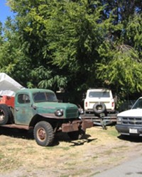 VALUABLE VEHICLES? :  Ken Slusser collects and restores military vehicles, which he keeps in his Santa Margarita yard. SLO County code enforcement officials are issuing clean-up orders and fines for vehicles stored outdoors in the Santa Margarita area, and are telling Slusser to pay up.