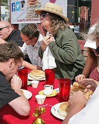 COMPETITIVE EATERS GOBBLE FLAPJACKS TO RAISE MONEY FOR AMPSURF AT PENNY'S ALL AMERICAN CAFE