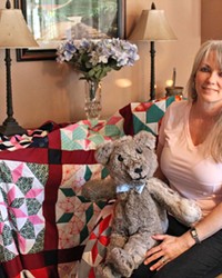 MEMORIES IN THE STITCH Lily Stitches Owner Lisa Adam created a quilt made with patches of her late grandmother’s work and a bear made from a fur coat given to her by her late father.