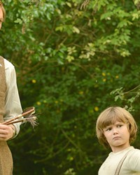 HUNDRED ACRE WOOD Author A.A. Milne (Domhnall Gleeson) finds inspiration to write Winnie the Pooh thanks to his son, Christopher Robin (Will Tilston), in Goodbye Christopher Robin.