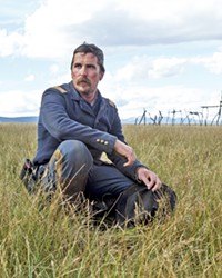 A HARD MAN Army Capt. Joseph J. Blocker (Christian Bale) adopts an evolving view of the U.S. conquests of the West when he's tasked with returning a group of Cheyenne to their Montana homeland.