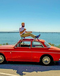 GIVING BACK IN STYLE Ryan Burmaster is president and co-founder of SloRolling, a vintage Volvo group that works on cars and gives back to the community.