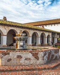 CALIFORNIA HISTORY North County photographer Dean Crawford often uses various filters when capturing images like this one of Mission San Miguel in order to give the piece a surreal look.