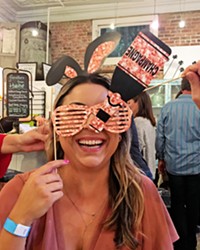 AFTER HOURS FUN New Times Marketing and Events Coordinator Rachelle Ramirez had some fun with photo props at Habitat Home and Garden.