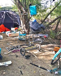 BEFORE Before the Blue Bag pilot launched in September, nearly every corner of the Higuera bridge homeless camp in SLO was overflowing with trash.