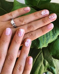 LITTLE DETAILS Whatever a bride desires for her nail set can be made possible by the creative nail technicians of Pinkies Up.