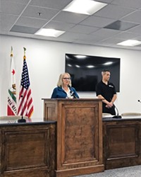 OPTIMISTIC SLO County Public Health Officer Penny Borenstein (at the podium) believes SLO County is ready to implement a phased plan to reopen the community.