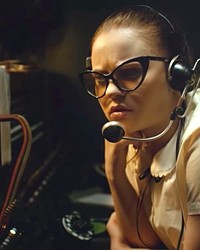 STRANGE SOUNDS One night in 1950s New Mexico, switchboard operator Fay (Sierra McCormick) discovers an odd radio frequency in The Vast of Night, screening on Amazon Prime.