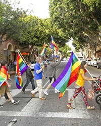 REVERSAL A group of demonstrators show their pride on Higuera Street in downtown SLO during a rally in 2017. On June 12 of this year, the U.S. Department of Health and Human Services removed nondiscrimination protections for transgender and nonbinary individuals seeking out health care and insurance coverage.