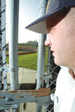 GOLDEN ERA GONE :  Tim Golden looks through the locked gate at Sinsheimer Stadium, where the Blues have played for more than a decade. - PHOTO BY STEVE E MILLER