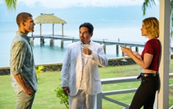 PHOTO COURTESY OF BLUMHOUSE - TROPICAL HORROR Mr. Roarke (Michael Pe&ntilde;a, center) facilitates fantasies for guests&mdash;such as Patrick (Austin Stowell, left) and Melanie (Lucy Hale, right)&mdash;on a remote island, but guests' dreams quickly turn into nightmares.