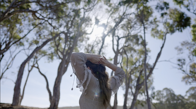 Still image from I Am Fine music video.